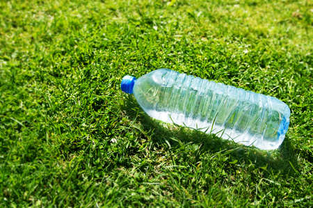 9267158-plastic-water-bottle-on-grass.jpg