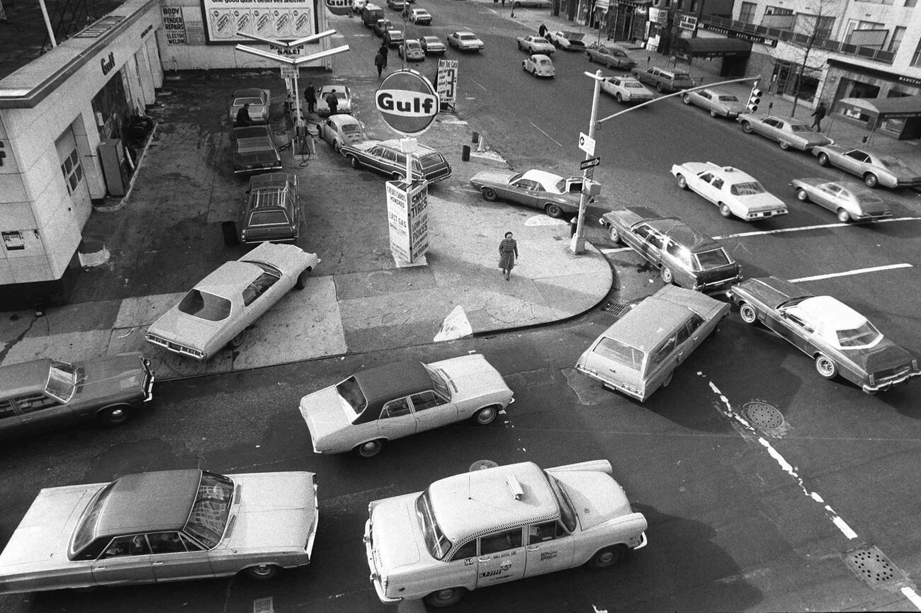 Cars line up in two directions at a gas station in New York City on Dec. 23, 1973.
