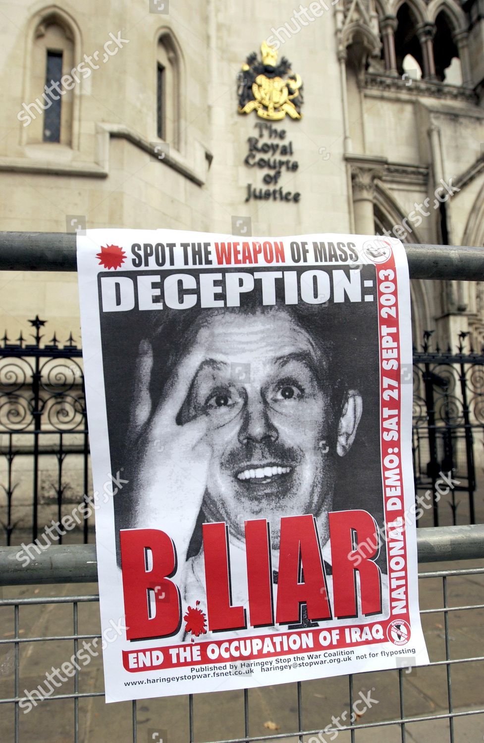 anti-tony-blair-posters-calling-for-an-end-to-the-occupation-of-iraq-outside-the-hutton-enquiry-at-the-high-court-london-britain-shutterstock-editorial-425002f.jpg