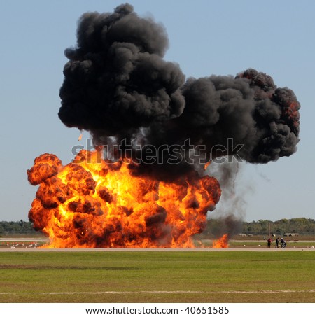 stock-photo-giant-outdoors-explosion-with-fire-and-black-smoke-40651585.jpg
