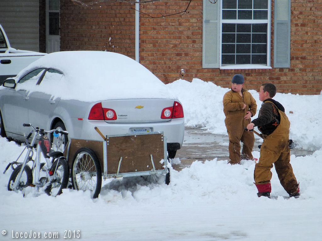 kids_shoveling_snow_bike-1.jpg