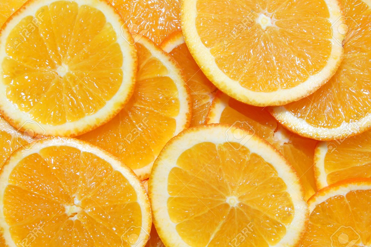 4677752-healthy-orange-fruit-background-with-sliced-oranges-Stock-Photo.jpg
