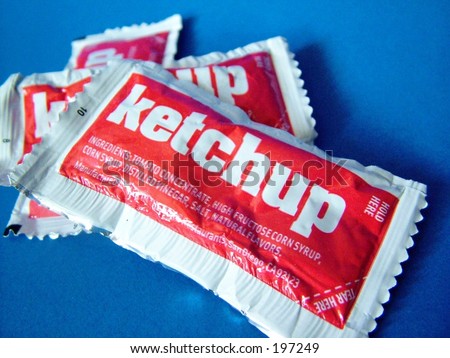 stock-photo-ketchup-packets-on-blue-background-close-up-197249.jpg