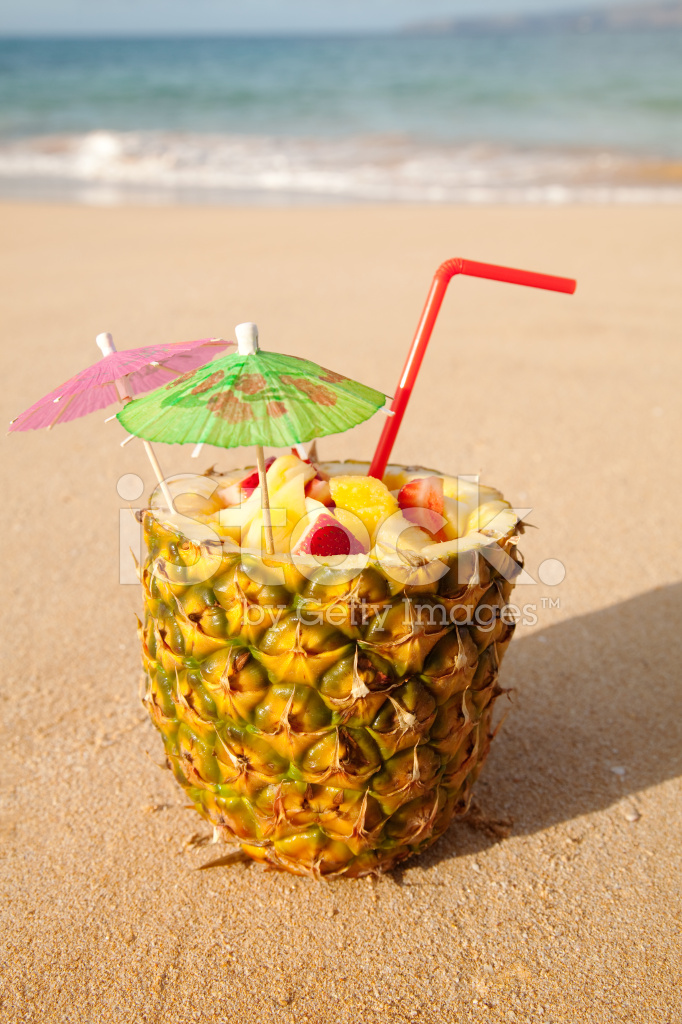 12646105-tropical-cocktail-in-pineapple.jpg