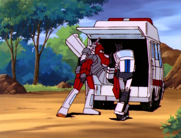 Ironhide_carried_into_Ratchet.jpg