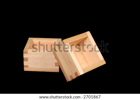 stock-photo-two-wooden-sake-cups-resting-on-a-black-background-2701867.jpg