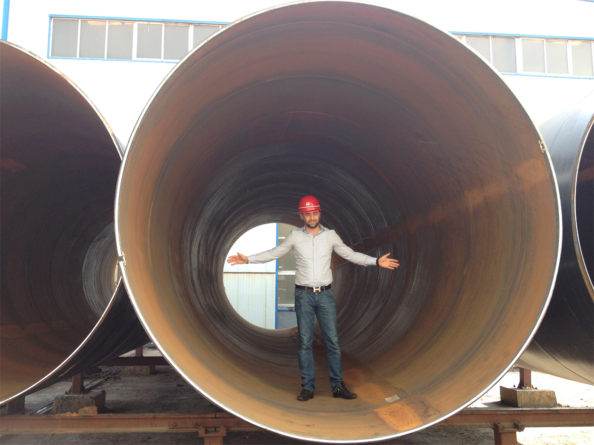 albania-client-standing-in-landee-large-diameter-steel-pipe.jpg