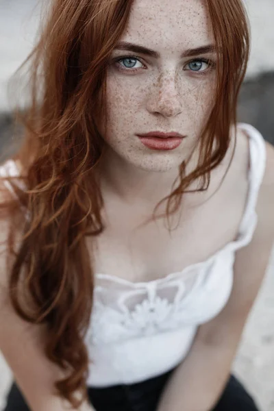 depositphotos_137229748-stock-photo-beautiful-redhead-girl-with-blue.jpg