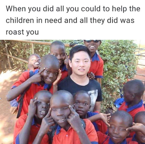 when-you-did-all-could-to-help-the-children-in-need-and-all-they-did-was-roast-you-chinese-guy-with-african-kids-1450629160.jpg