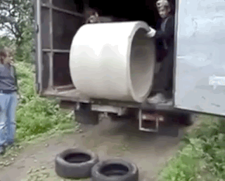 hu-men-Unloading-a-concrete-pipe-with-tires.gif