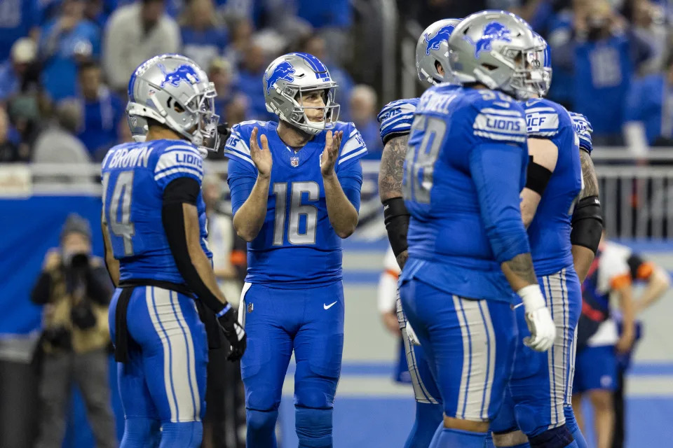 DETROIT, MICHIGAN - JANUARY 14: Jared Goff #16 of the Detroit Lions claps during a time out during the game against the Los Angeles Rams at Ford Field on January 14, 2024 in Detroit, Michigan. The Lions beat the Rams 24-23. (Photo by Lauren Leigh Bacho/Getty Images)