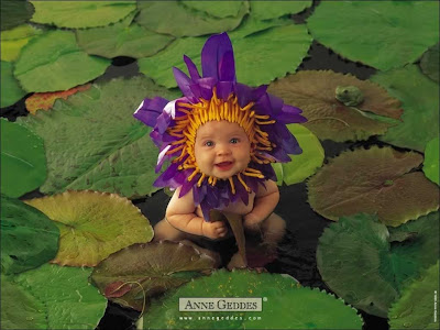 cute+baby+with+lotus+leaf.jpg