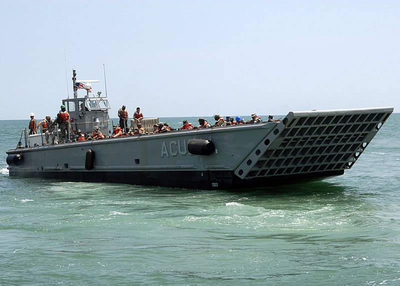 800px-US_Navy_090615-N-6676S-456_Landing_Craft_Mechanized_%28LCM%29_14%2C_assigned_to_Assault_Craft_Unit_%28ACU%29_2%2C_transports_Sailors%2C_Soldiers_and_Marines_during_operations_supporting_Joint_Logistics_Over-The-Shore_%28JLOTS%29_exercises.jpg
