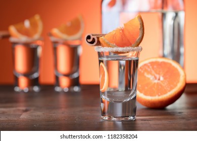 glasses-tequila-orange-cinnamon-sticks-260nw-1182358204.jpg