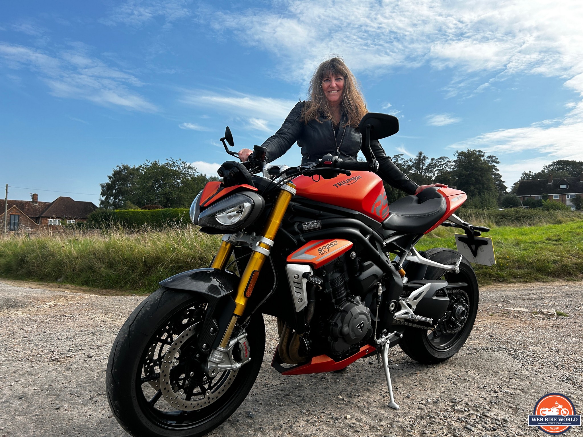 BikerKaz standing behind 2023 Triumph Speed Triple 1200 RS