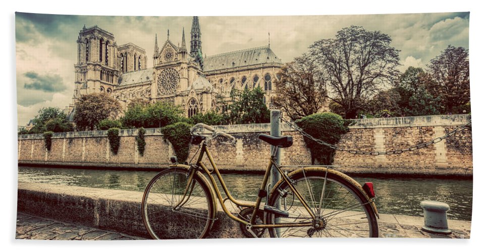 retro-bike-next-to-notre-dame-cathedral-in-paris-france-vintage-michal-bednarek.jpg