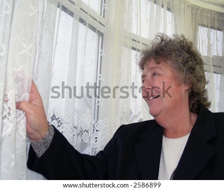 stock-photo-watching-life-behind-net-curtains-old-age-2586899.jpg