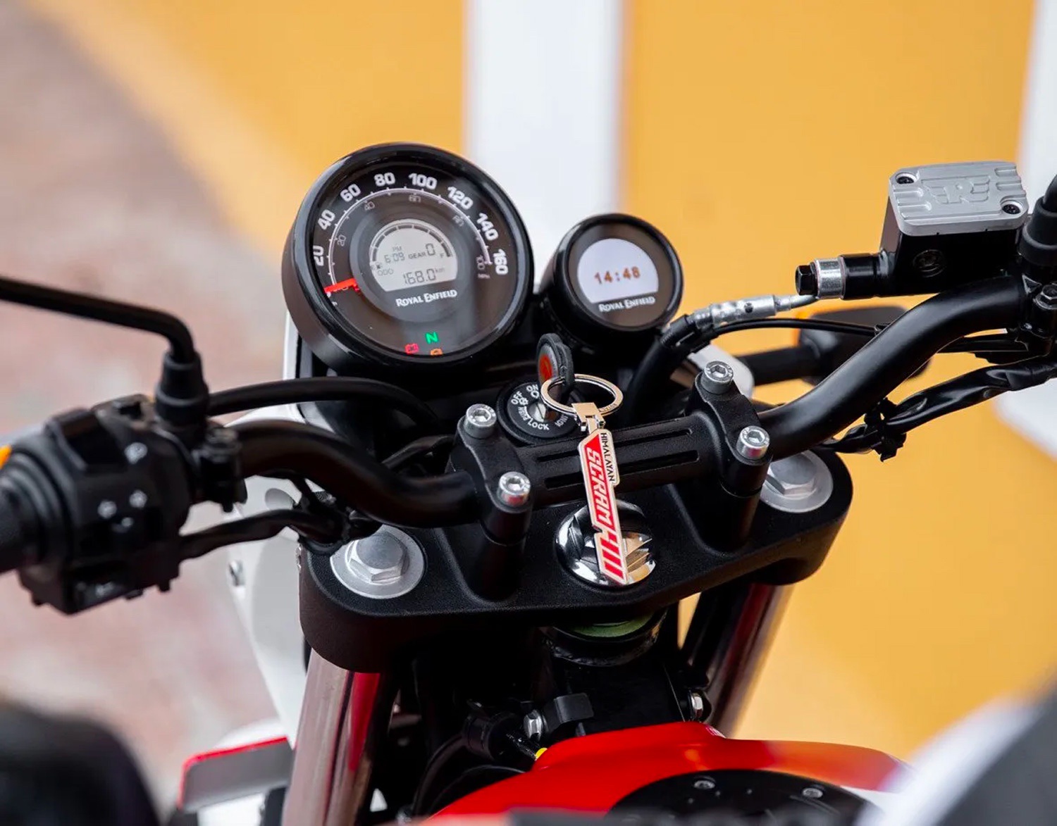 A 2022 Royal Enfield Scram 411 closeup showing the motorcycle's dash