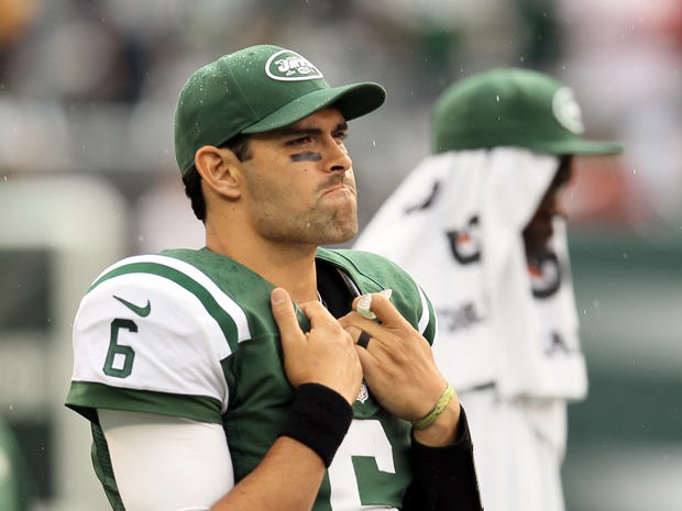 mark-sanchez-holding-pads.jpg