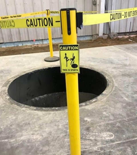caution-construction-hole-this-is-sparta.jpg