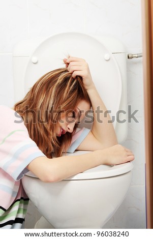 stock-photo-young-teen-woman-vomiting-in-toilet-96038240.jpg