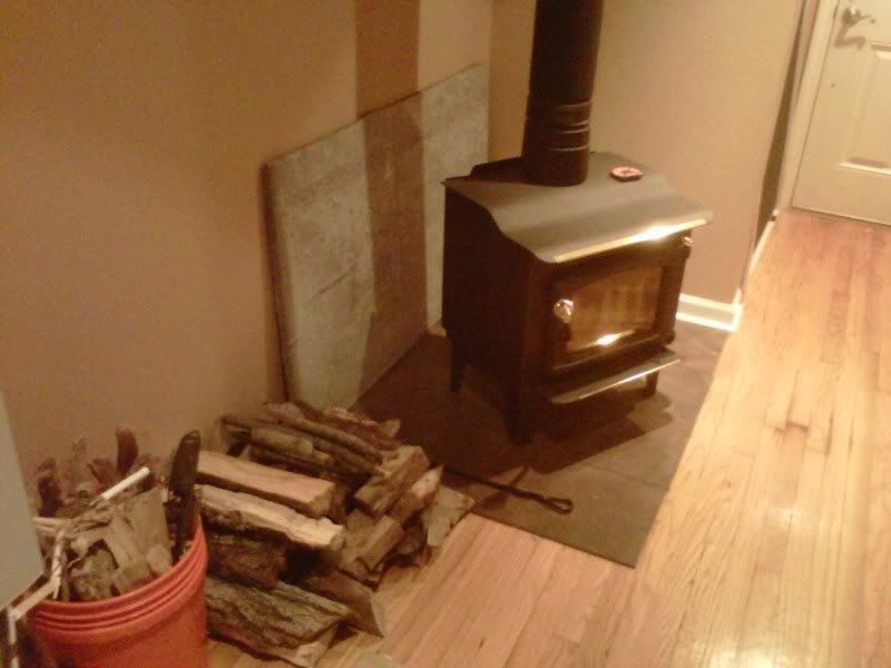Stove Installed - Tiled heat shield - Blazing Burners: Wood Burner  Installations