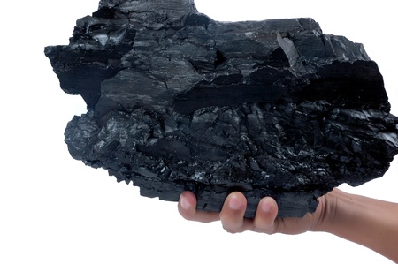 10111137-male-hand-holding-a-big-lump-of-coal-isolated-on-white-background.jpg