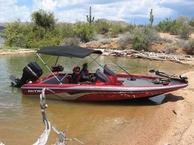 Put a bimini top on the bass boat. Was so awesome having it on while fishing  it seems like they should come factory installed. : r/boating
