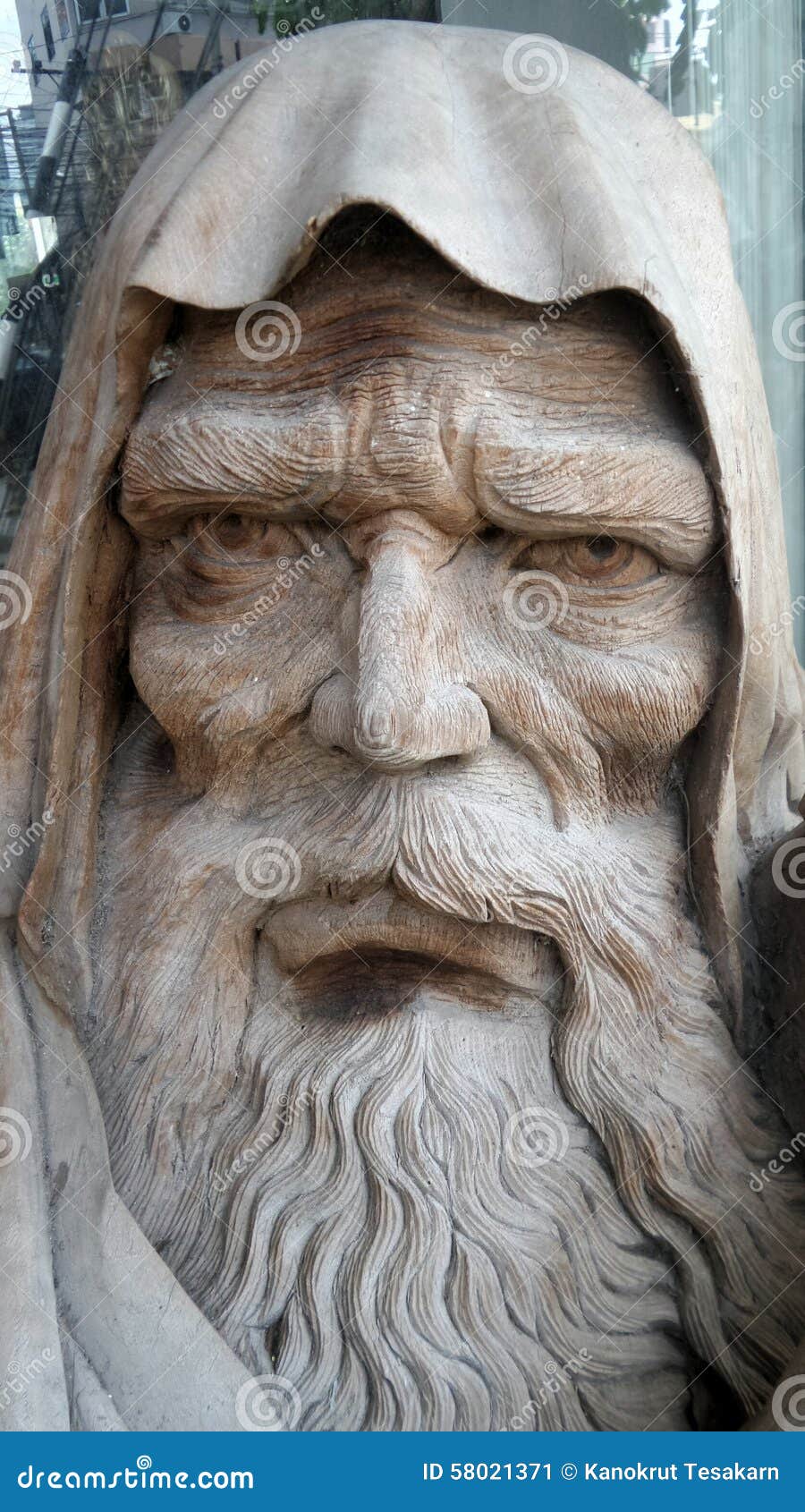 old-man-long-beard-wood-carving-close-up-white-carve-58021371.jpg