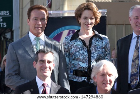 stock-photo-arnold-schwarzenegger-sigourney-weaver-james-cameron-city-officials-at-the-hollywood-walk-of-147294860.jpg