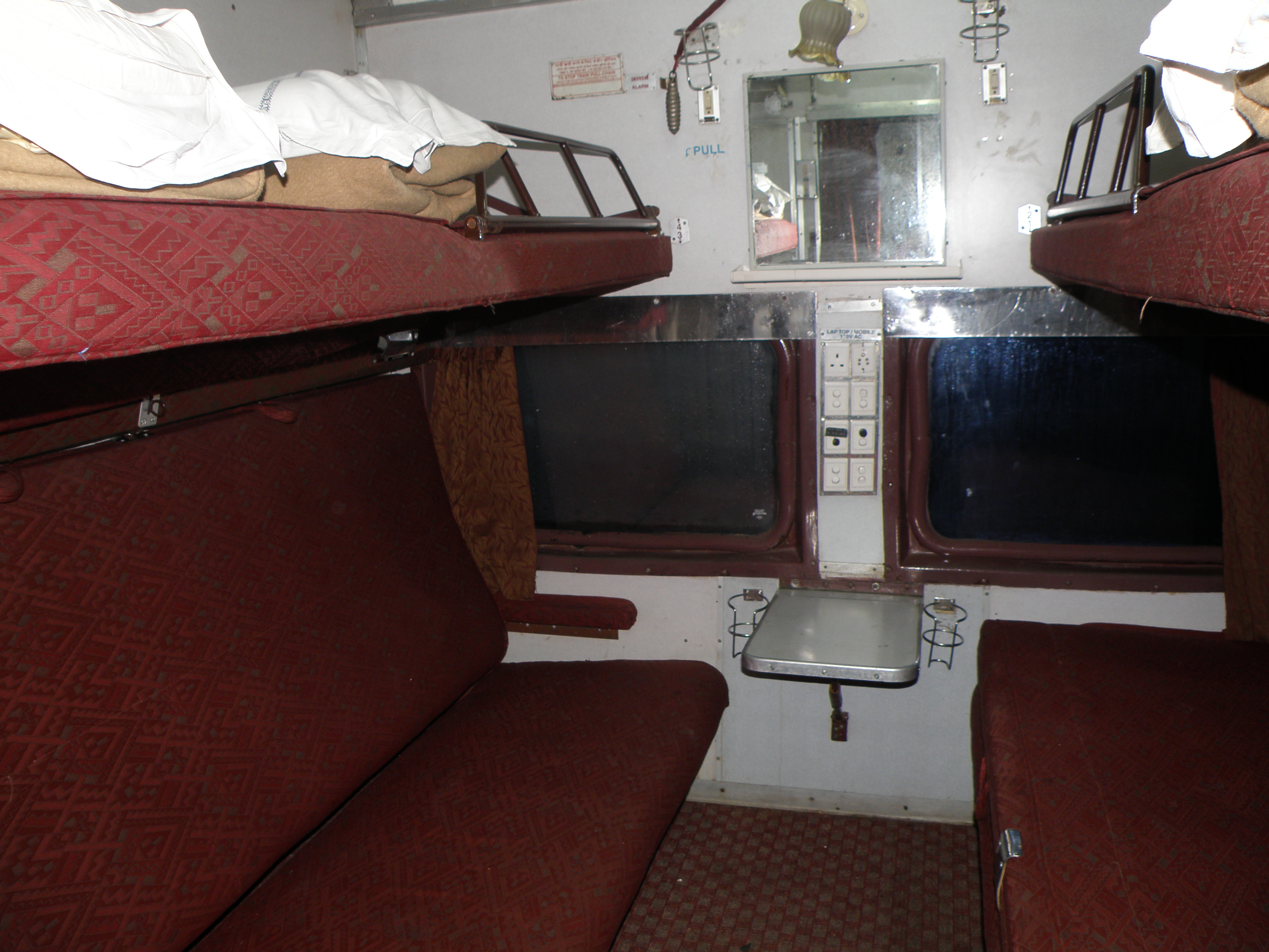 Indian_Railways_AC_first_class_4-berth_cabin.JPG