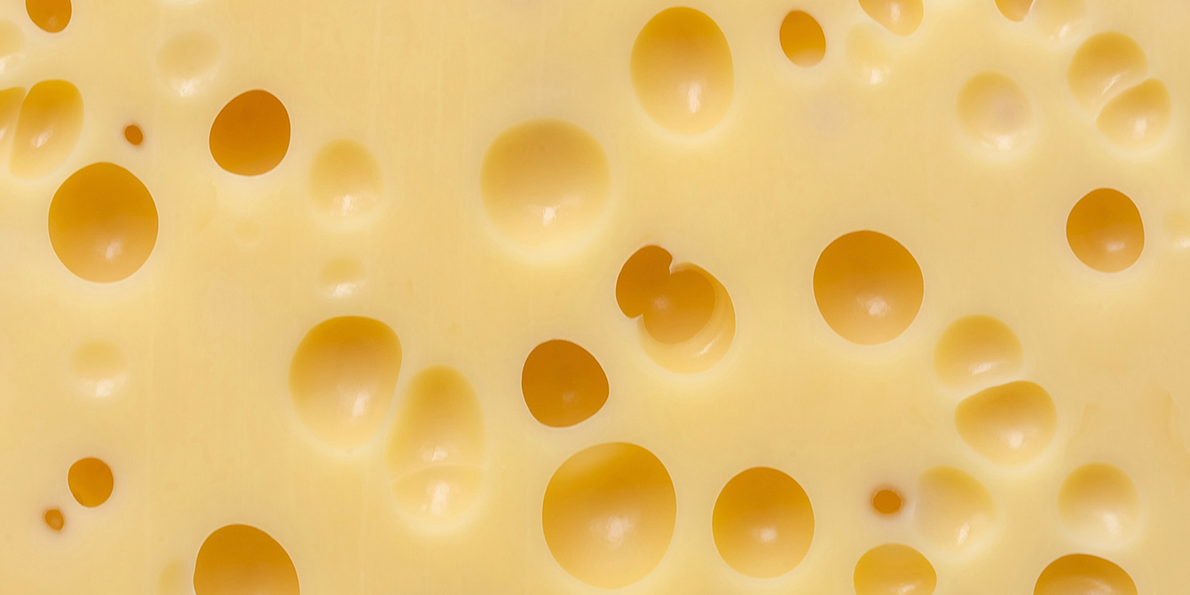 why-swiss-cheese-has-those-mysterious-giant-holes.jpg