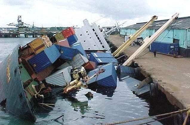 cargo-ship-sinking-boat-spilling-load_zps3cd8bc7b.jpg