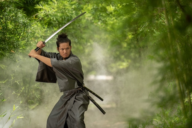 japanese-samurai-fighter-wearing-traditional-uniform_33835-1015.jpg