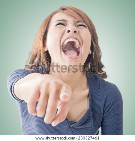 stock-photo-asian-woman-pointing-and-laughing-at-you-closeup-portrait-230327461.jpg