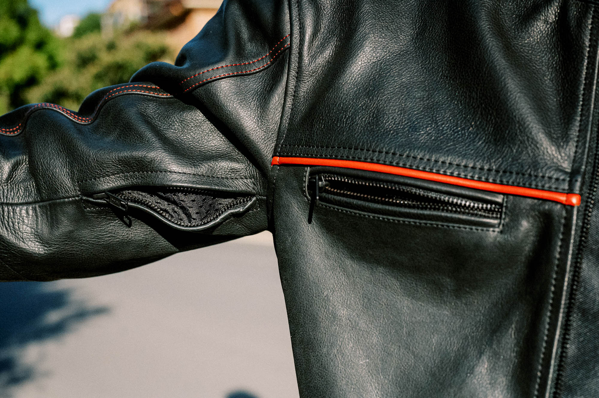 Black Pup Moto's new Rumbler Jacket on a rider - detail shot