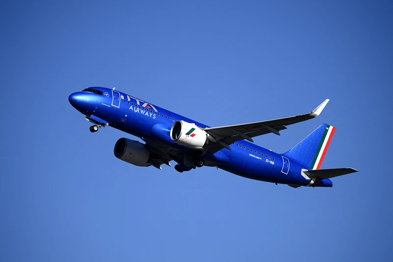 An ITA Airways Airbus A320-272N airplane carrying Pope Francis takes off from Rome's Fiumicino airport, as he departs for his trip to Hungary on April 28, 2023. - Pope Francis arrived in Hungary on April 28, 2023 for a three-day visit likely to be dominated by the war in Ukraine and his meeting with nationalist Prime Minister Viktor Orban, whose views often clash with his own. (Photo by Filippo MONTEFORTE / AFP) (Photo by FILIPPO MONTEFORTE/AFP via Getty Images)