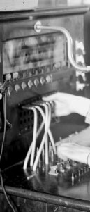 Phone operator using a switchboard