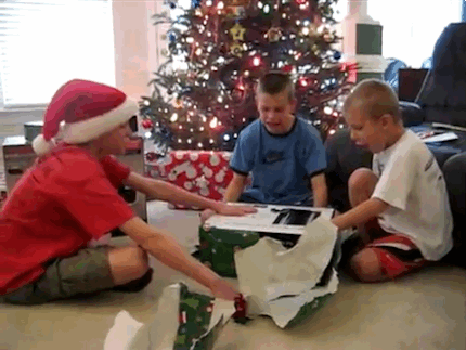 happy_and_excited_children_on_christmas_morning_04.gif