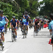 TAIPING-MALAYSIA-APRIL-10-Cyclists-pass-through-feeding-zone-during-Stage-5-of-the-24th-Le-Tour-de-L.jpg