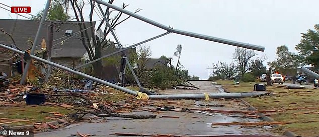 A massive powerline was thrown down during the storm, landing on the roof of a house