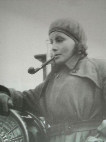 Greta Garbo smoking a pipe