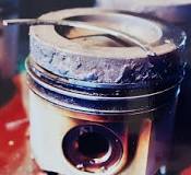 Image result for oil burning causes piston rings to stick