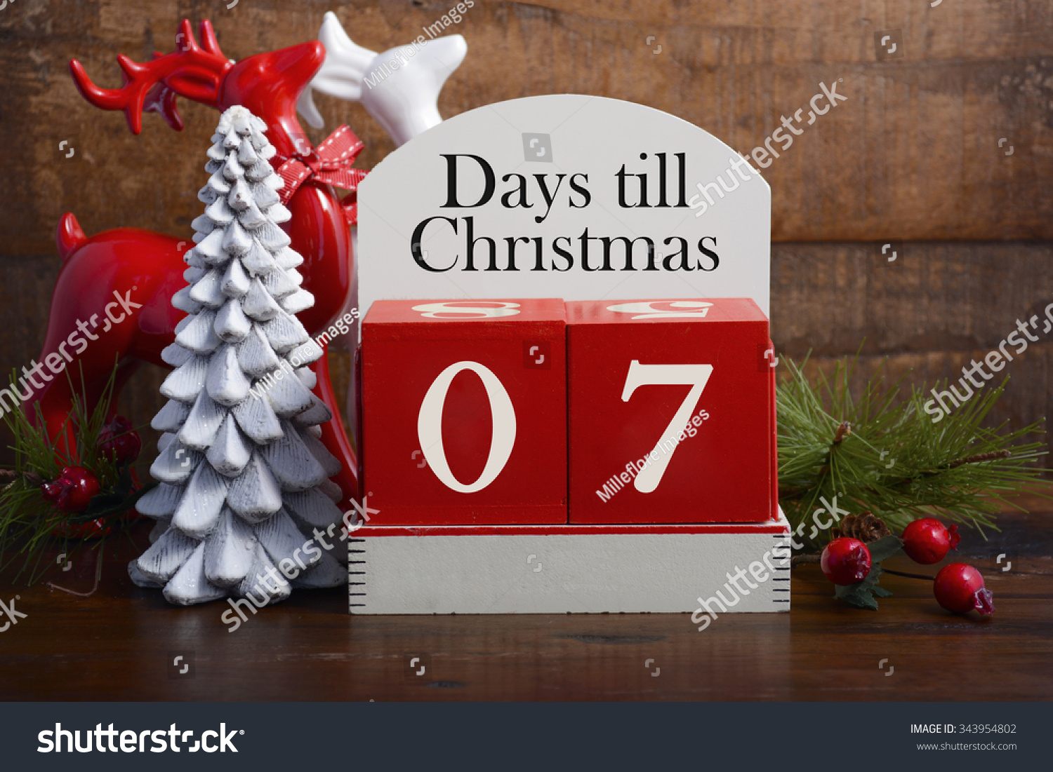 stock-photo--days-till-christmas-vintage-style-wood-calendar-with-red-and-white-reindeers-and-decorations-343954802.jpg