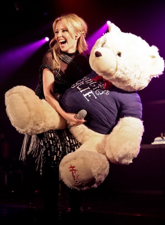 kylie-minogue-playing-with-teddy-bear.jpg