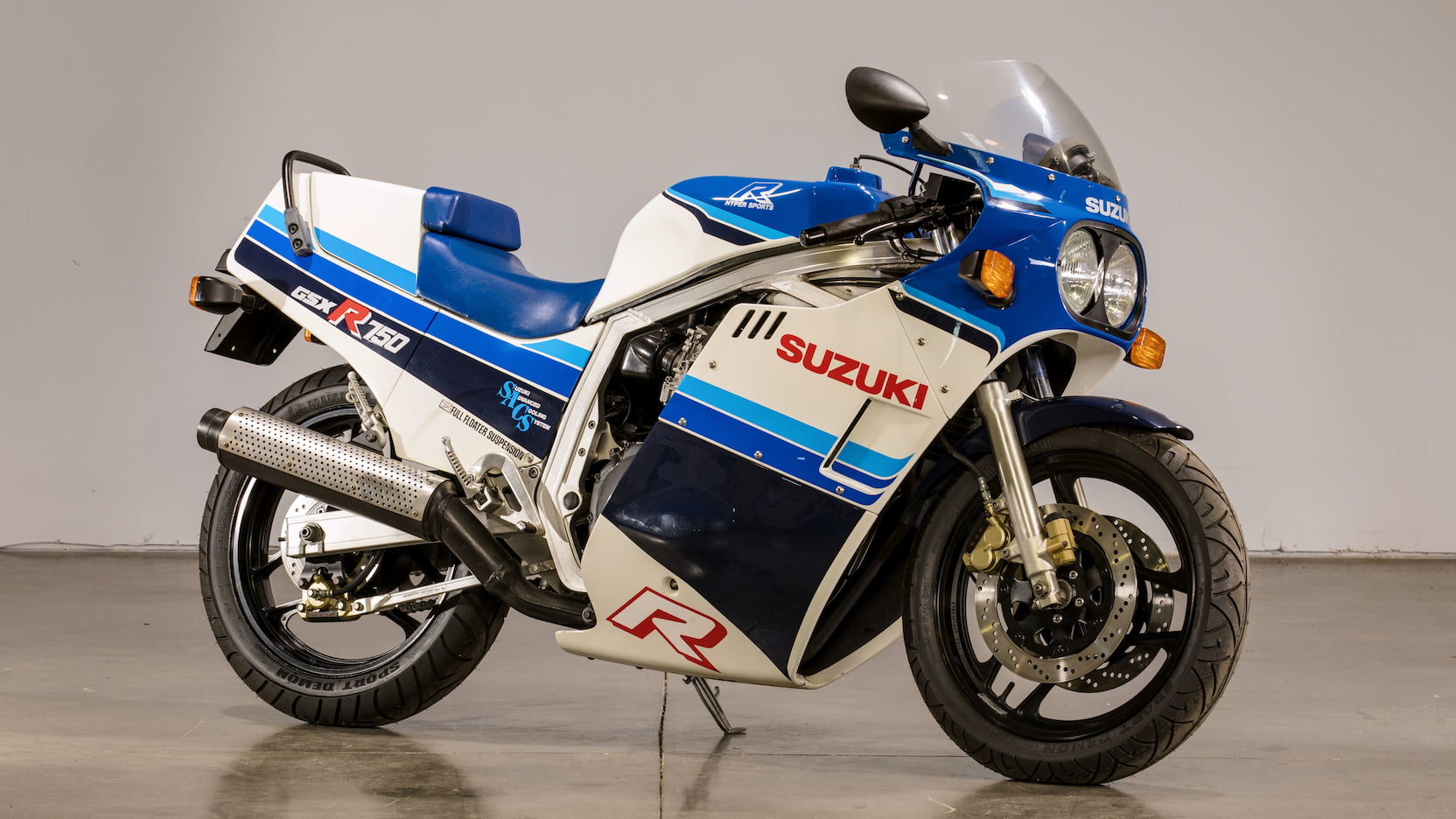 1985 Suzuki GSXR 750 with kickstand down indoors