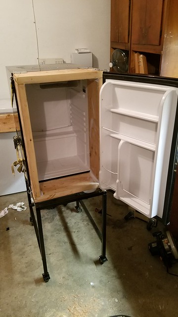 Built a stand for a mini fridge that I use for making beer. Not