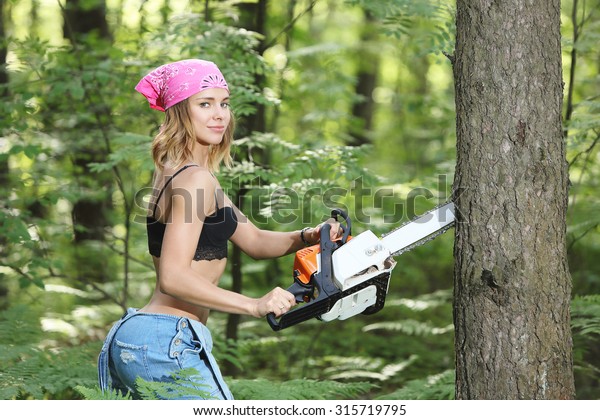 girl-chainsaw-forest-sawing-wood-600w-315719795.jpg