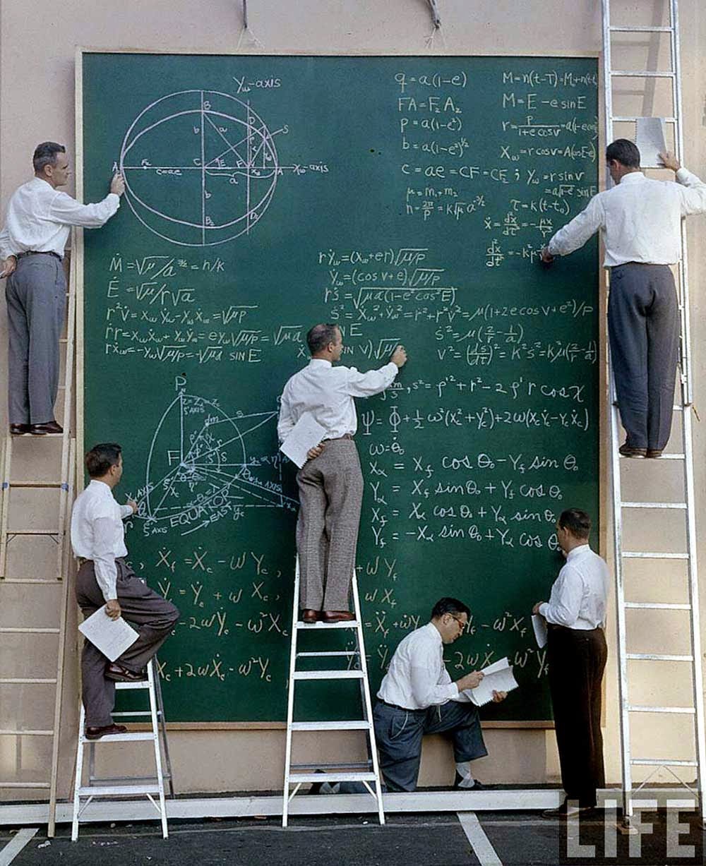 NASA+scientists+with+their+board+of+calculations,+1961.2.jpg