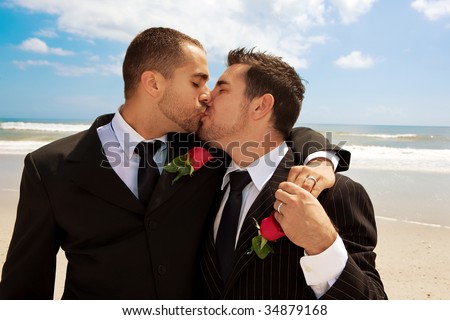 stock-photo-two-gay-men-after-wedding-on-a-beach-kissing-34879168.jpg